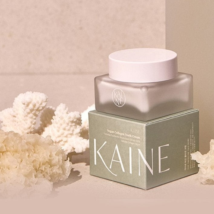 KAINE Vegan Collagen Youth Cream 50ml jar on elegant display with decorative elements