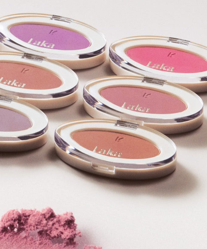 Various shades of LAKA Love Silk Blush compacts on display, vibrant and soft tones perfect for a silky makeup finish.