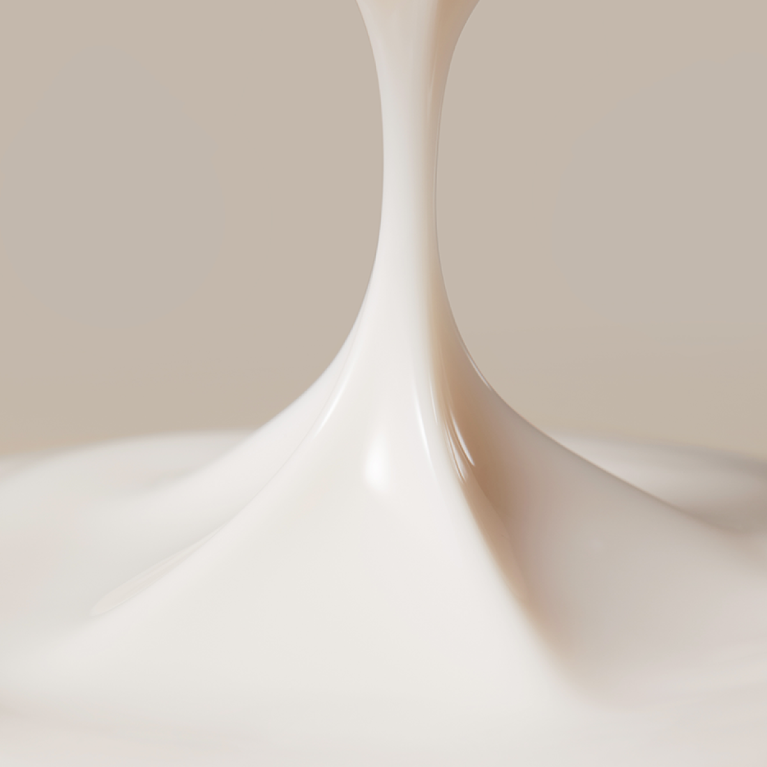 Close-up of flowing LANEIGE Perfect Renew 3X Emulsion Advanced 130ml, showcasing its smooth and creamy texture against a soft background.