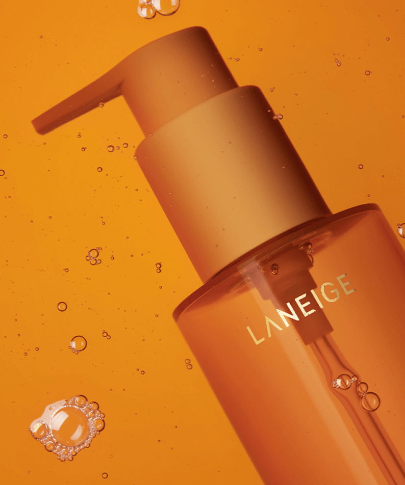 LANEIGE Perfect Renew Nourishing Oil To Foam Cleanser 200ml bottle with pump, orange background with bubbles, skin care product