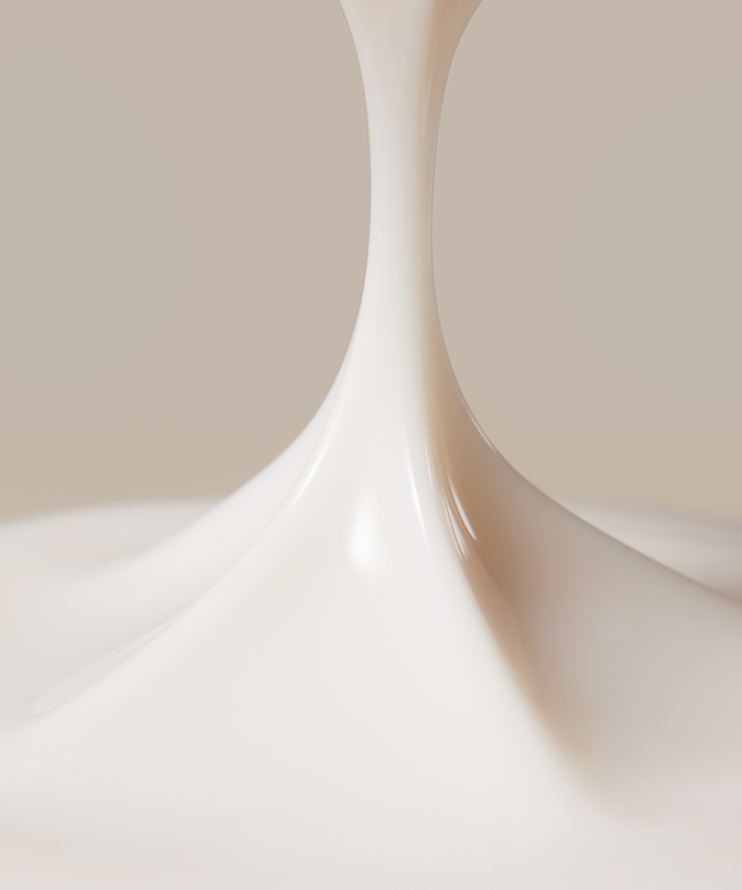 Close-up of flowing LANEIGE Perfect Renew 3X Emulsion Advanced 130ml, showcasing its smooth and creamy texture against a soft background.