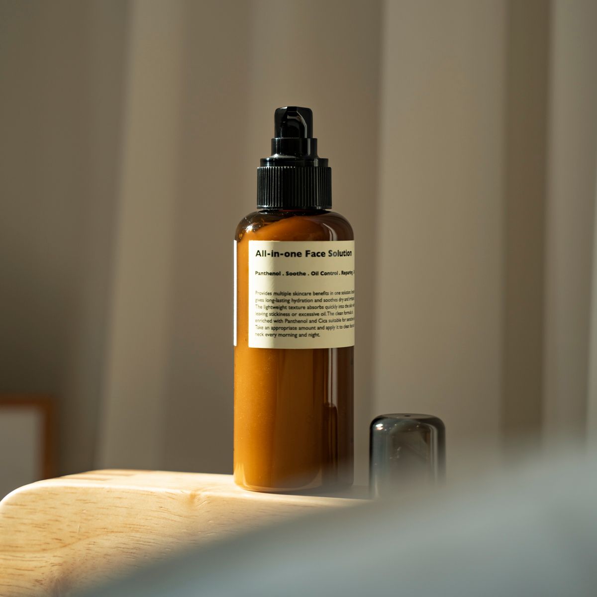 LAZY SOCIETY All-in-One Face Solution 150g brown pump bottle on wooden surface Gentleman Korea Korean men skincare export