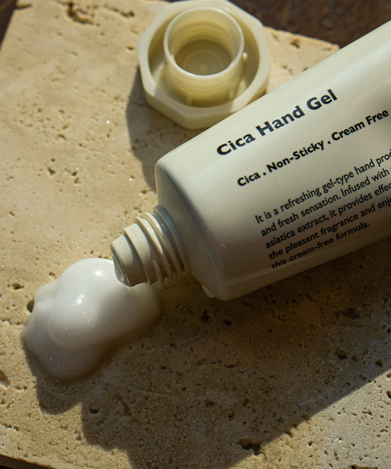 LAZY SOCIETY Cica Hand Gel 50ml tube dispensing gel on textured stone, Gentleman Korea men’s skincare product