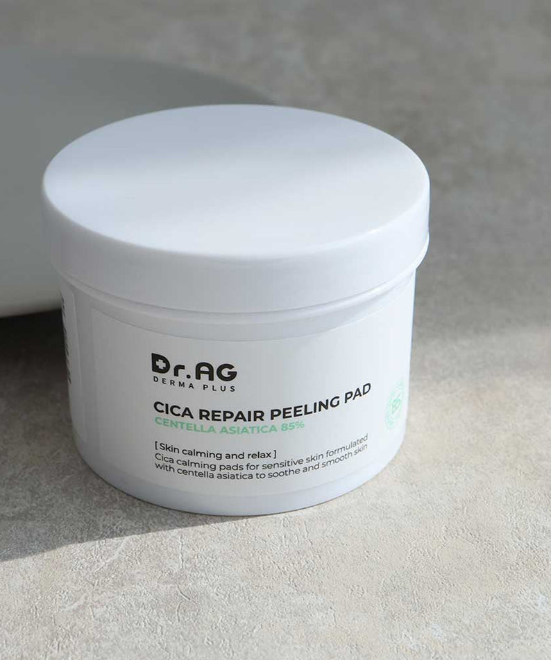 Dr.AG Cica Repair Peeling Pad container with product details and branding, designed for skin calming and repair with Centella Asiatica.