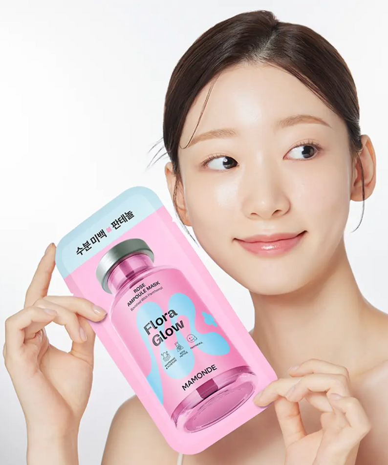 MAMONDE Flora Glow Rose Ampoule Mask Pack held by a woman with clear skin, highlighting skincare benefits.