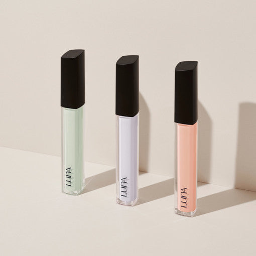 Three tubes of LUNA Long Lasting Corrector in different shades against a neutral background.