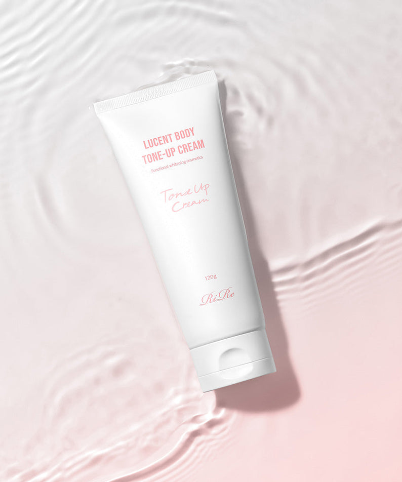 RIRE Lucent White Tone-Up Cream showcased on a soft pink water ripple background.