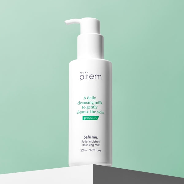 MAKE P:REM Safe Me Relief Moisture Cleansing Milk bottle on a shelf with a green background