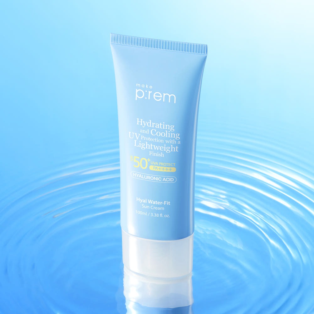 MAKE P:REM Hyal Water Fit Sunscreen 100ml bottle on reflective water surface