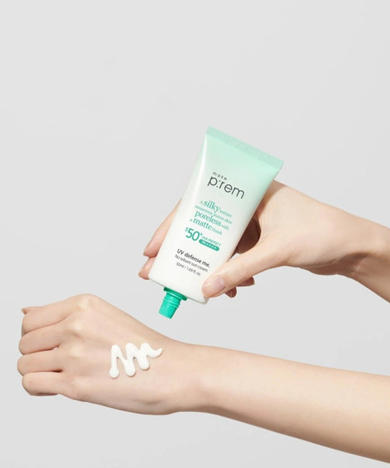 Person applying MAKE P:REM UV Defense Me No-Sebum Sunscreen 50ml on arm