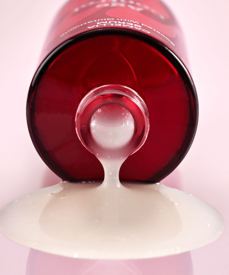 MAMONDE Age Control Camellia Serum 50ml bottle with serum pouring out