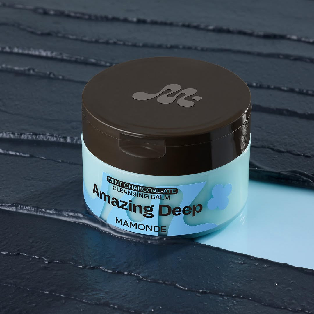 MAMONDE Amazing Deep Mint Chocolate Cleansing Balm 90ml jar on a textured blue surface.