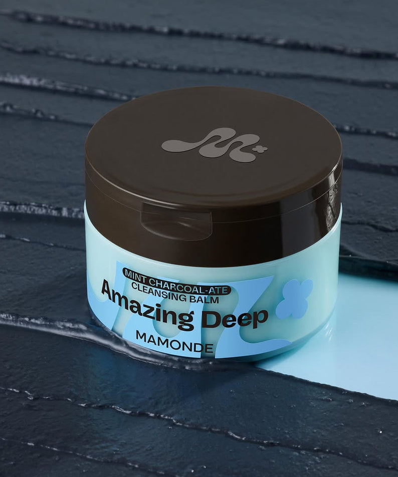 MAMONDE Amazing Deep Mint Chocolate Cleansing Balm 90ml jar on a textured blue surface.