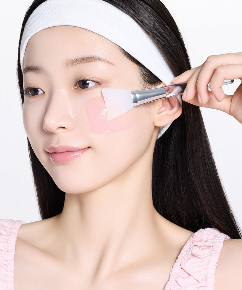 MAMONDE Flora Glow Rose Sleeping Mask 80ml being applied on face with brush applicator for radiant skin care
