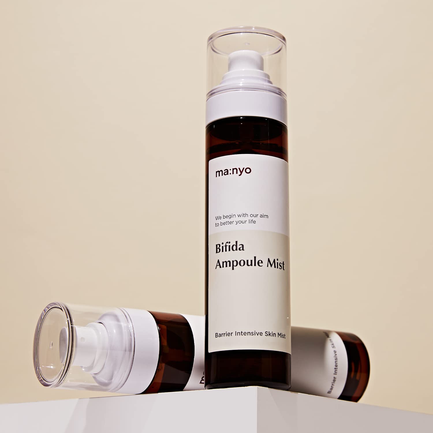 MANYO Bifida Ampoule Mist 120ml skincare product displayed on a pedestal.