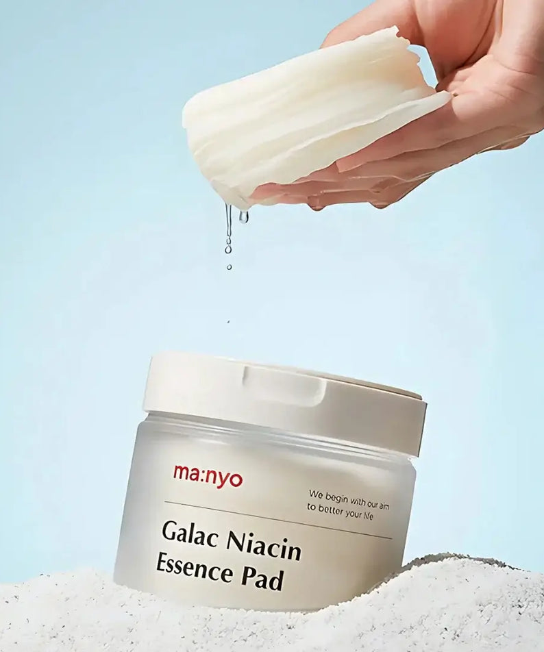 MANYO Galac Niacin Essence Pad 80 Sheets with lid open and wet pads, showcasing essence extraction.