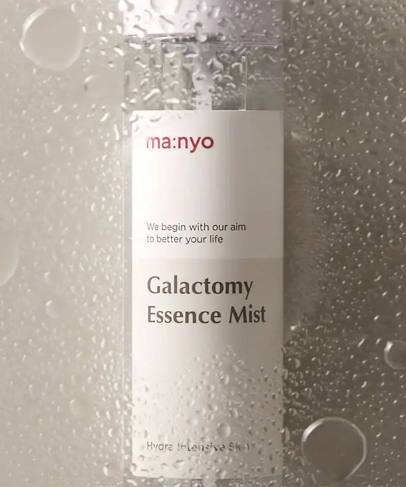 MANYO Galactomy Essence Mist 120ml, hydrating facial spray bottle with water droplets, skincare product display