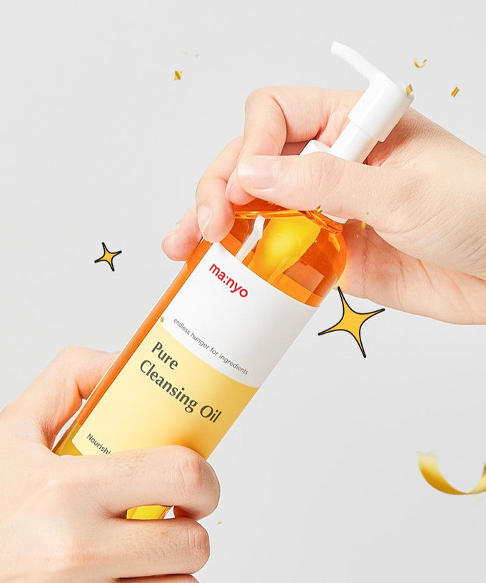 Hands holding a bottle of MA:NYO Pure Cleansing Oil, a skincare product with a pump dispenser, against a light background.