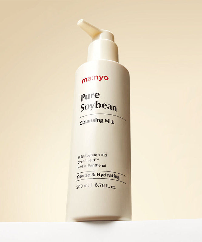 MANYO Pure Soybean Cleansing Milk 200ml bottle on display with beige background, featuring gentle and hydrating skincare benefits.