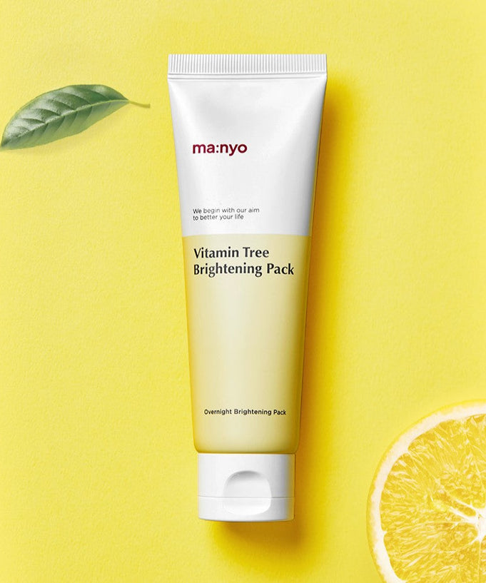 MA:NYO Vitamin Tree Brightening Pack 75ml tube on a yellow background with green leaf and lemon slice