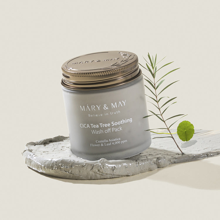 MARY & MAY Cica Tea Tree Soothing Wash off Pack 125g displayed with natural elements