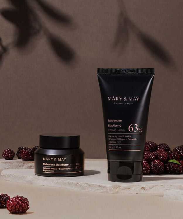 MARY & MAY Idebenone Blackberry Intense Cream with natural blackberries background