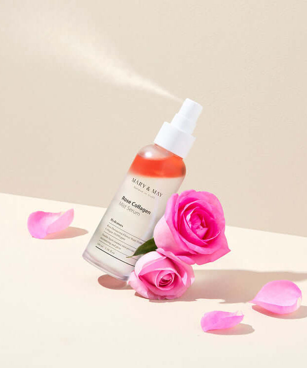 MARY & MAY Marienmay Rose Collagen Mist Serum with pink roses in a minimalistic setting