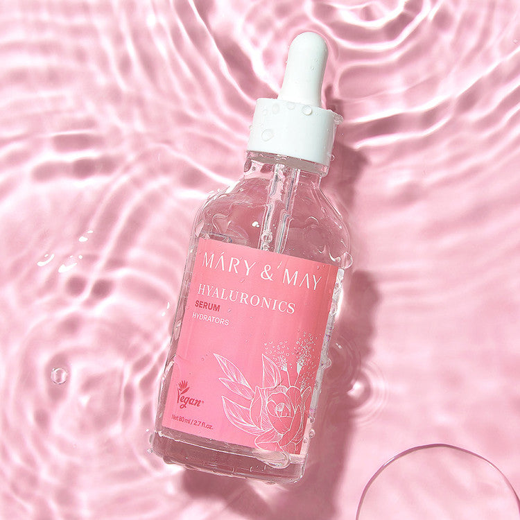 MARY&MAY Hyaluronic Serum 80ml bottle with water ripples and pink design background