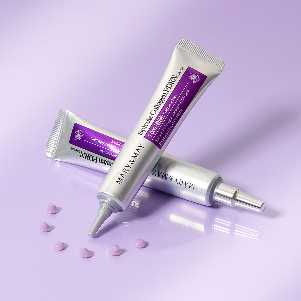 MARY&MAY Speckle Collagen PDRN Cream 15g tubes on a purple background with small cream dots