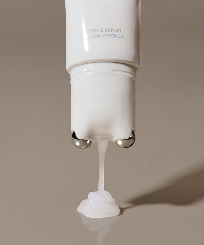 MARSHIQUE Wrinkle Repair Guasha Essence 45ml shown with product creamy texture against a neutral background.