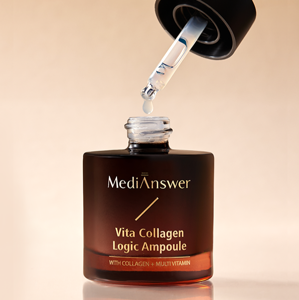 Close-up of MEDIANSWER Vita Collagen Logic Ampoule with dropper, showing bottle design and vitamin-rich ampoule for skincare.