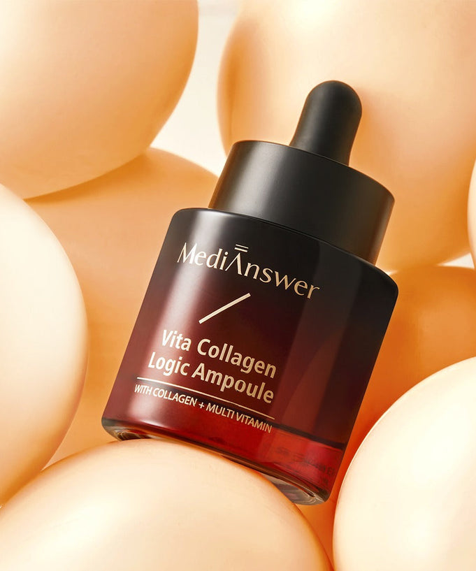 MEDIANSWER Vita Collagen Logic Ampoule surrounded by soft, light-colored spheres, highlighting the skincare product's elegant design.