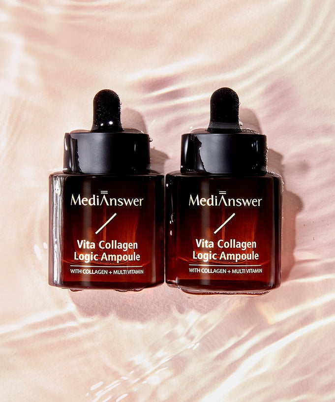 Two bottles of MEDIANSWER Vita Collagen Logic Ampoule skincare product with droppers, placed on a textured surface.
