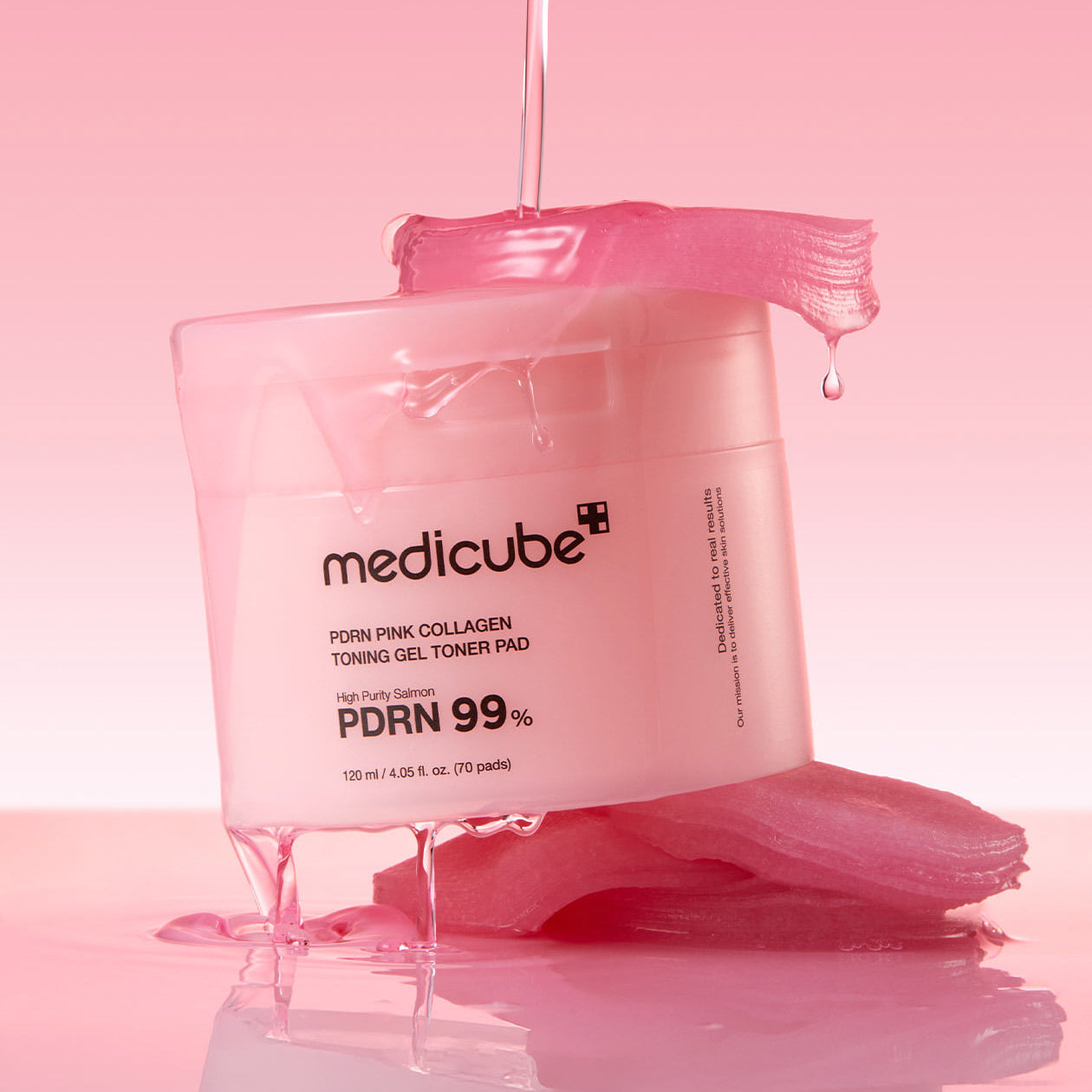 MEDICUBE PDRN Pink Collagen Toning Gel Toner Pad 70pads showcasing product packaging on a pink background.