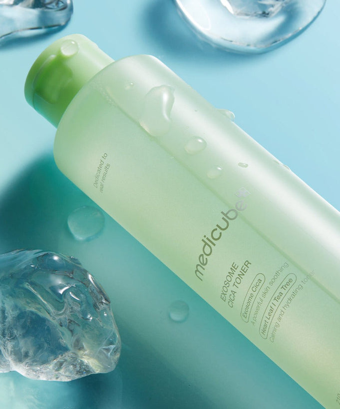 MEDICUBE Exosome Cica Toner 210ml bottle on a teal background with ice cubes