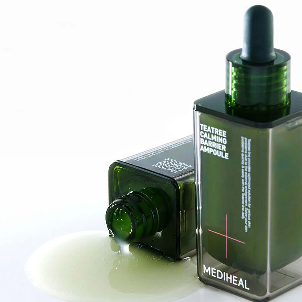 MEDIHEAL Tea Tree Soothing Barrier Ampoule 50ml with open bottle and spilled serum on white background.