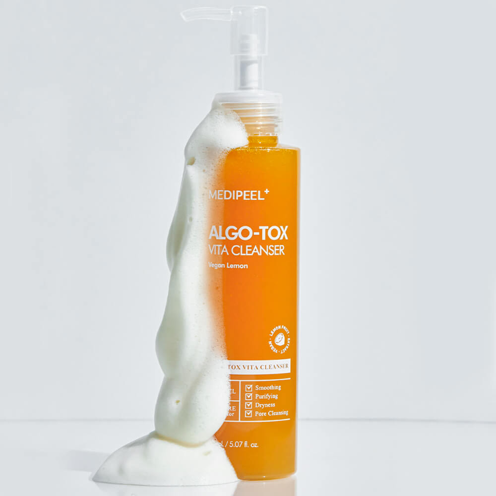 MEDIPEEL Algo Tox Vita Cleanser 150ml bottle with foamy texture, skincare product for deep cleansing and hydration.