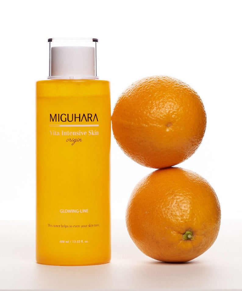 MIGUHARA Vita Intensive Skin Origin 400ml with two oranges, skincare product for glowing skin.