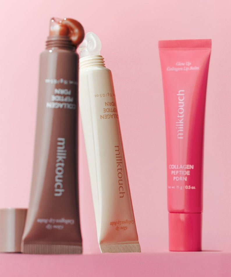 MILK TOUCH Glow Up Collagen Lip Balm 15g displayed with open and closed tubes on a pink background.