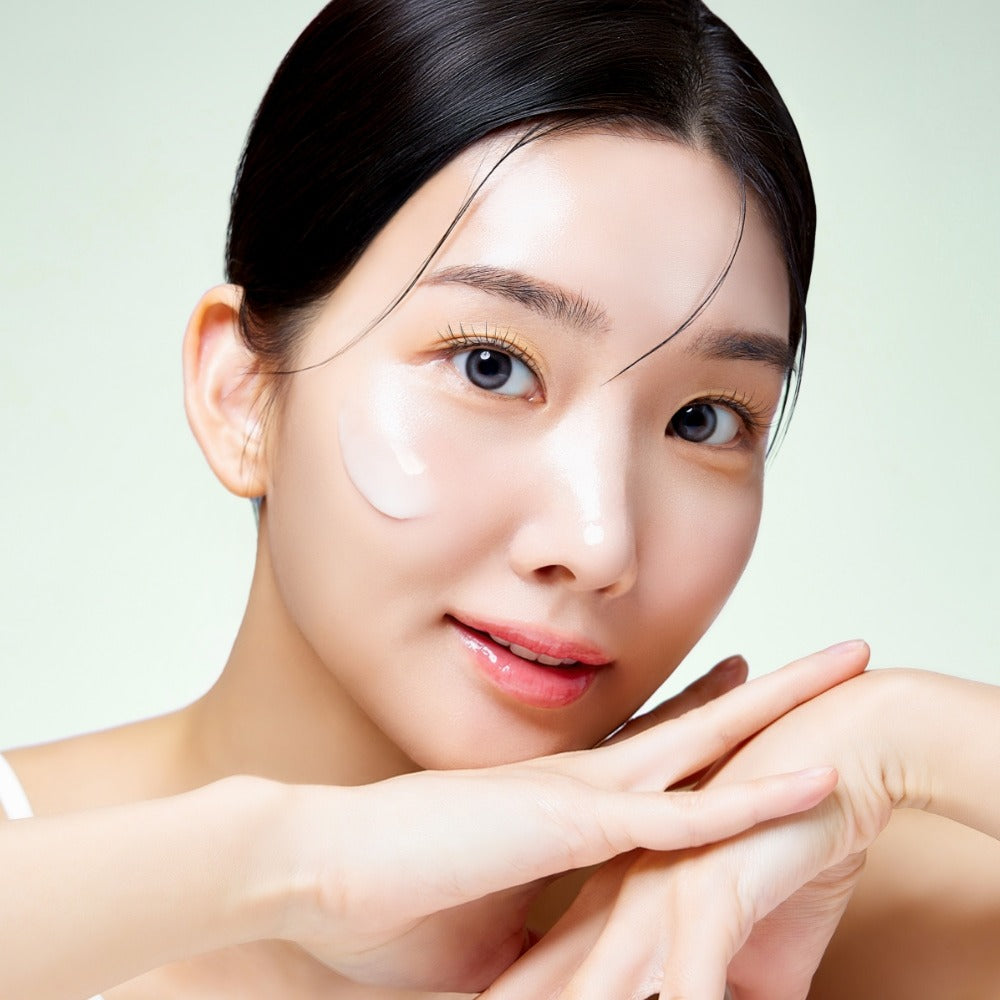 Model applying MIXSOON Cica Hyal Deep Soothing Cream 50ml on smooth, radiant skin