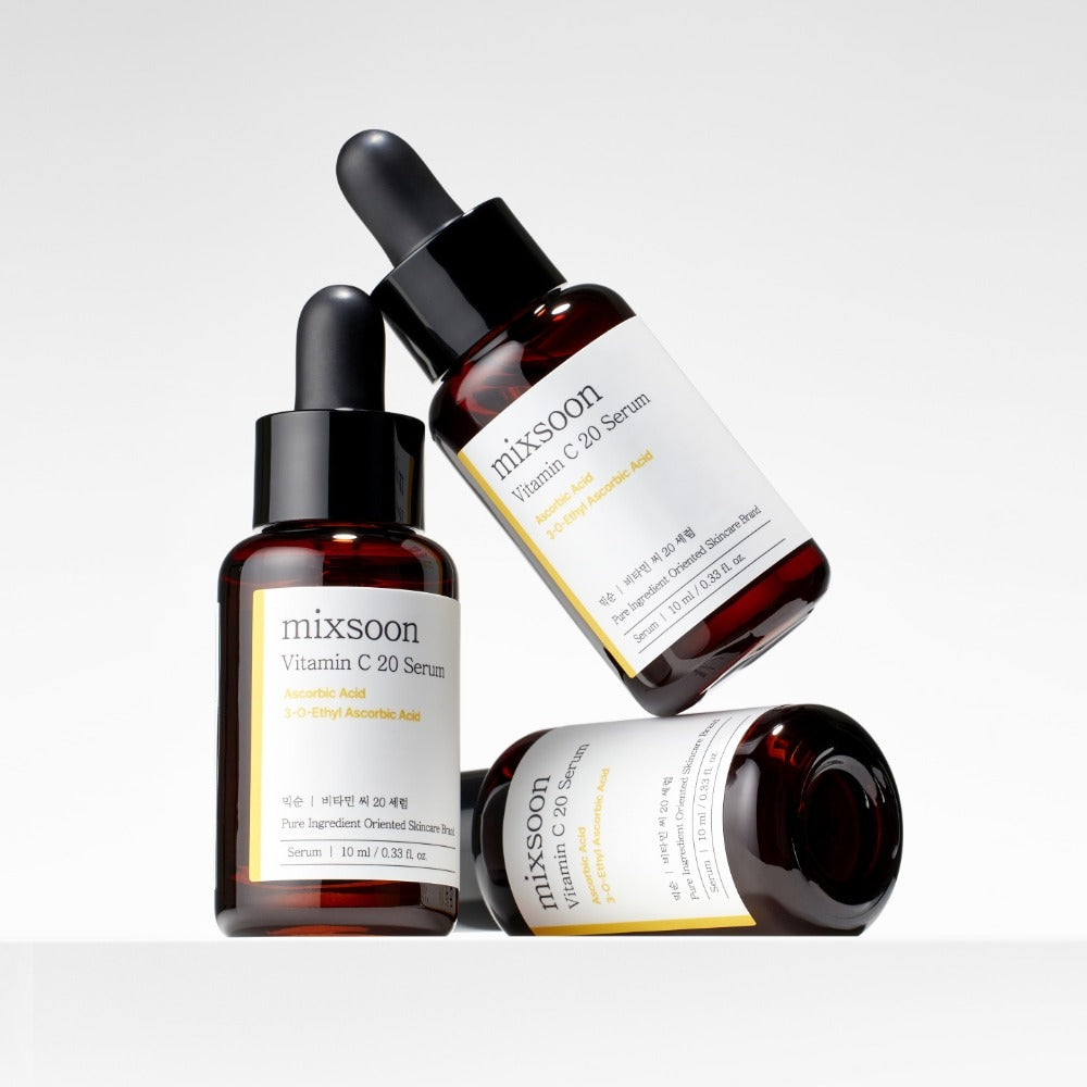 Three bottles of MIXSOON Vitamin C 20 Serum 10ml with dropper caps.