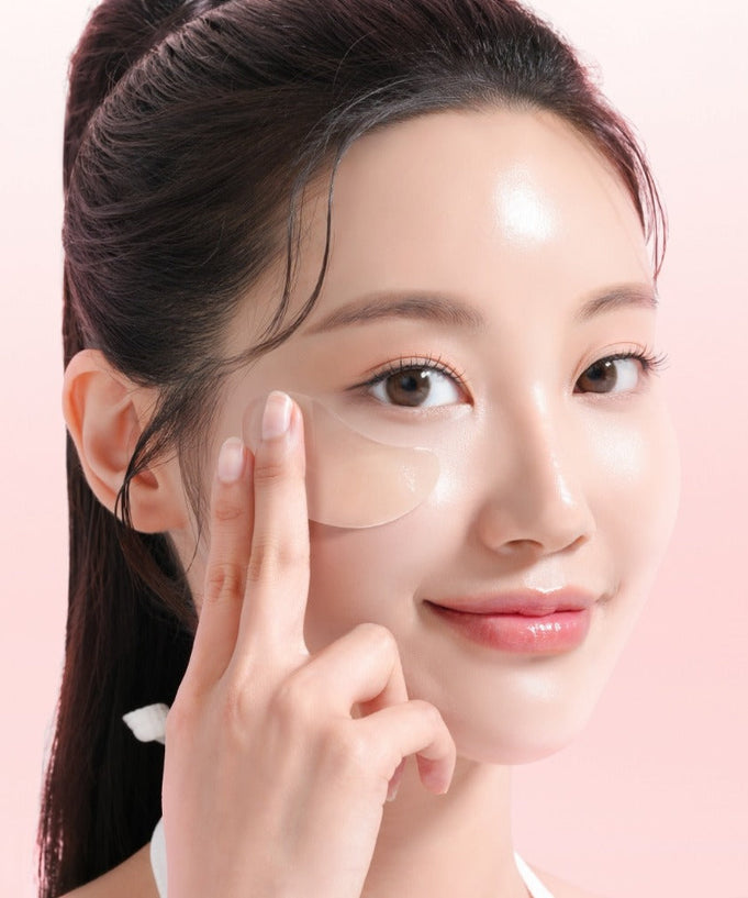 Woman applying MIXSOON Collagen Hydrogel Eye Patch Single Pack 5 Sheets