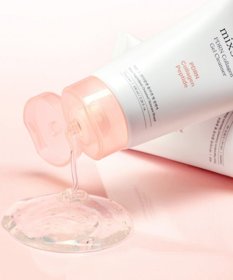 MIXSOON PDRN Collagen Gel Cleanser 100ml bottle on pink surface with gel pouring out