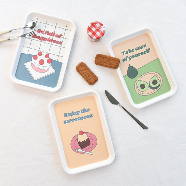 Set of MONOLIKE Fall In Newtro Tray with sweet and motivational designs, biscuits, and butter knife on a white surface.