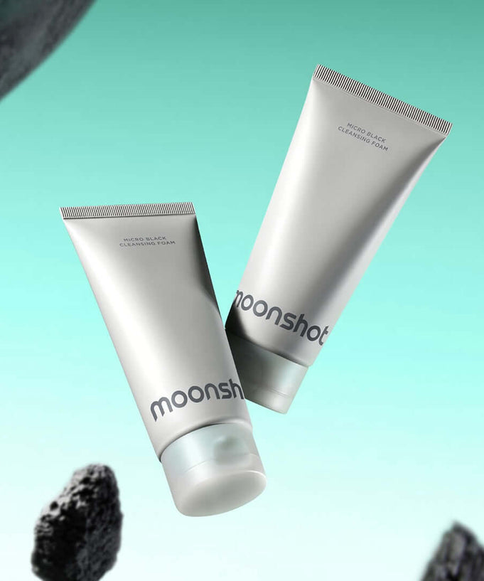 MOONSHOT Micro Black Cleansing Foam in sleek packaging with a vibrant background.