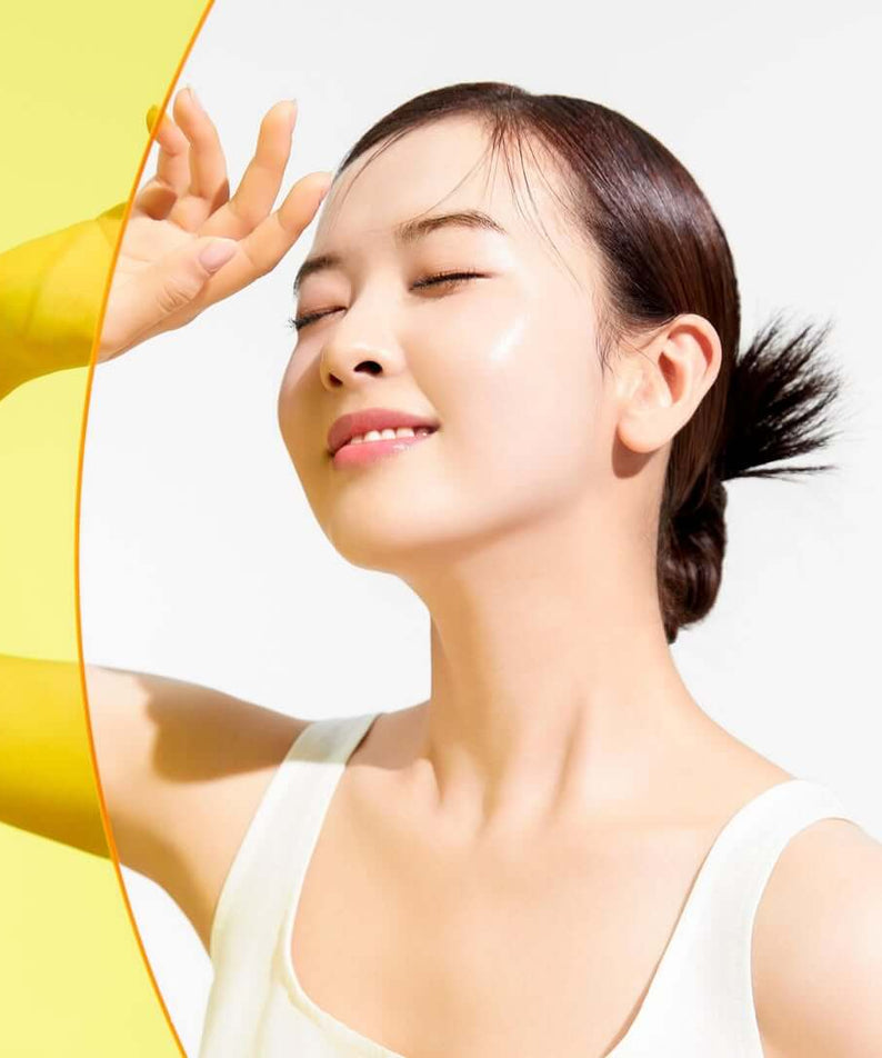 Person enjoying sun protection with MOONSHOT Tone Tuning UV Skin Tint SPF50+ PA++++