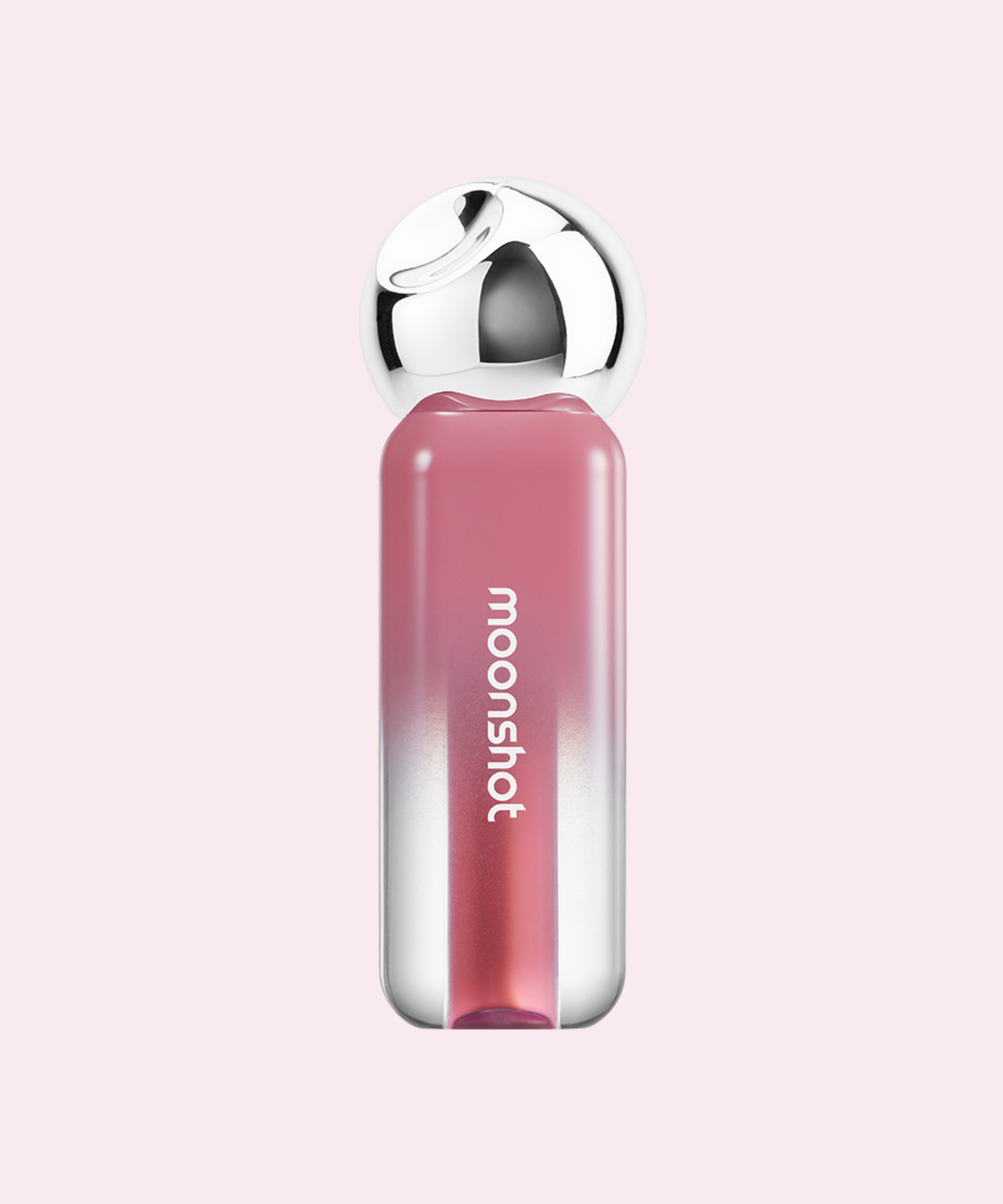 MOONSHOT Jelly Moon Glow Tint in pink shade on a soft pink background, featuring a sleek design with metallic accents.