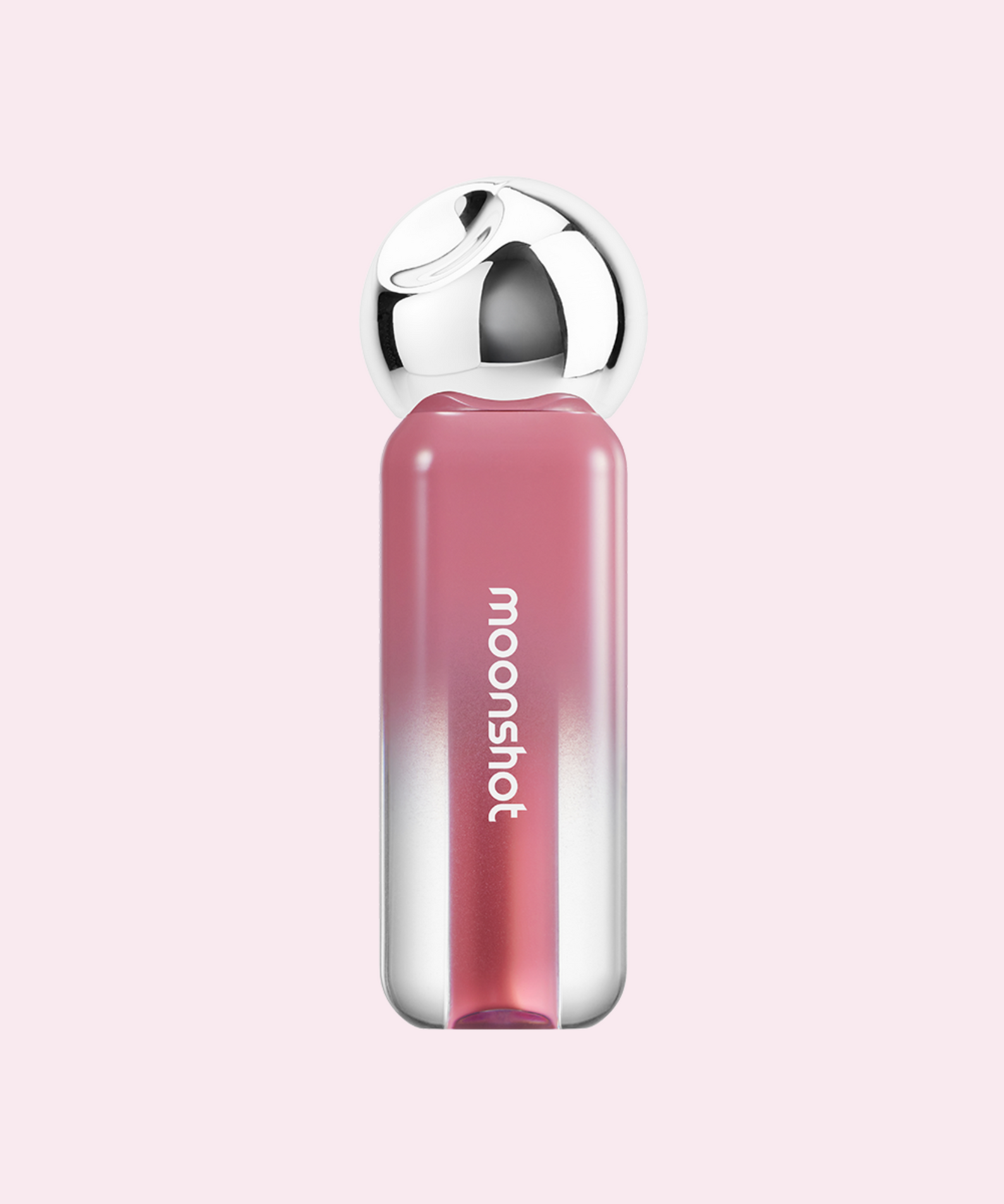 MOONSHOT Jelly Moon Glow Tint in pink shade on a soft pink background, featuring a sleek design with metallic accents.