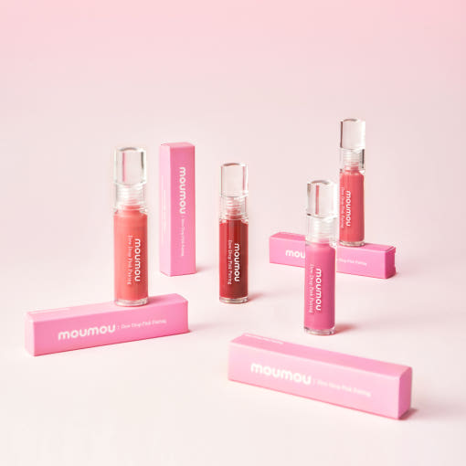MOUMOU Dew Drop Pink Pairing Tint lip glosses displayed against a pink background.