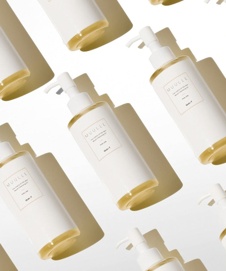 Pattern of QUA-T Cleansing oil 200ml bottles, skincare product emphasis.